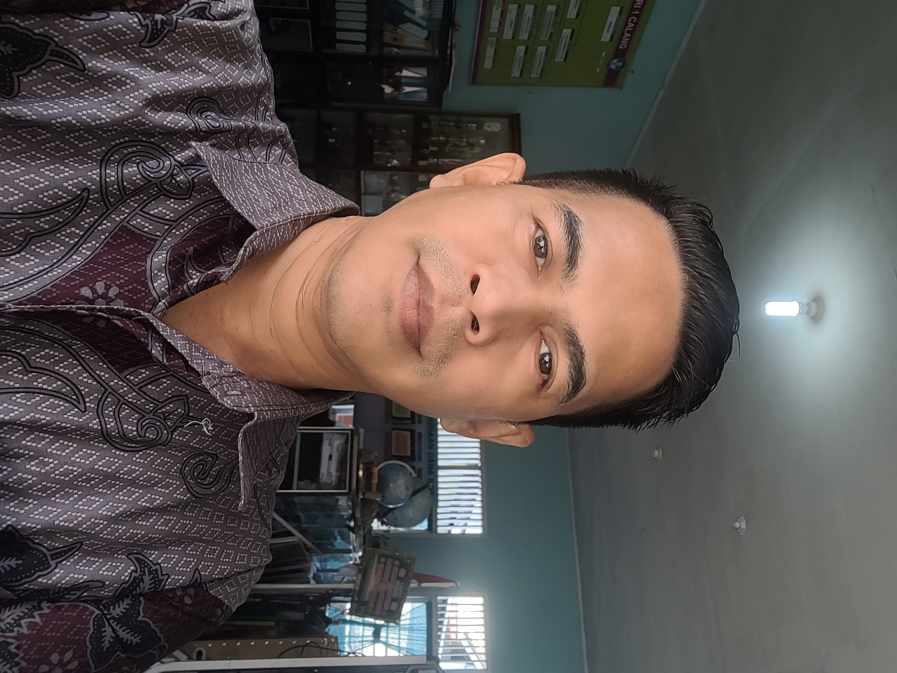 Fauzan, S. Pd